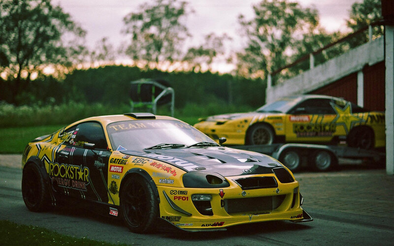 Yellow Race Car — Dramatic, Sunset, Photograph, Trailer