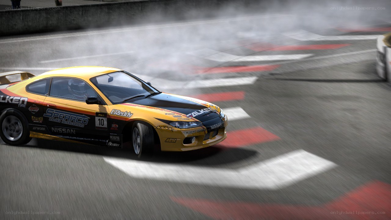 Yellow race car drifting