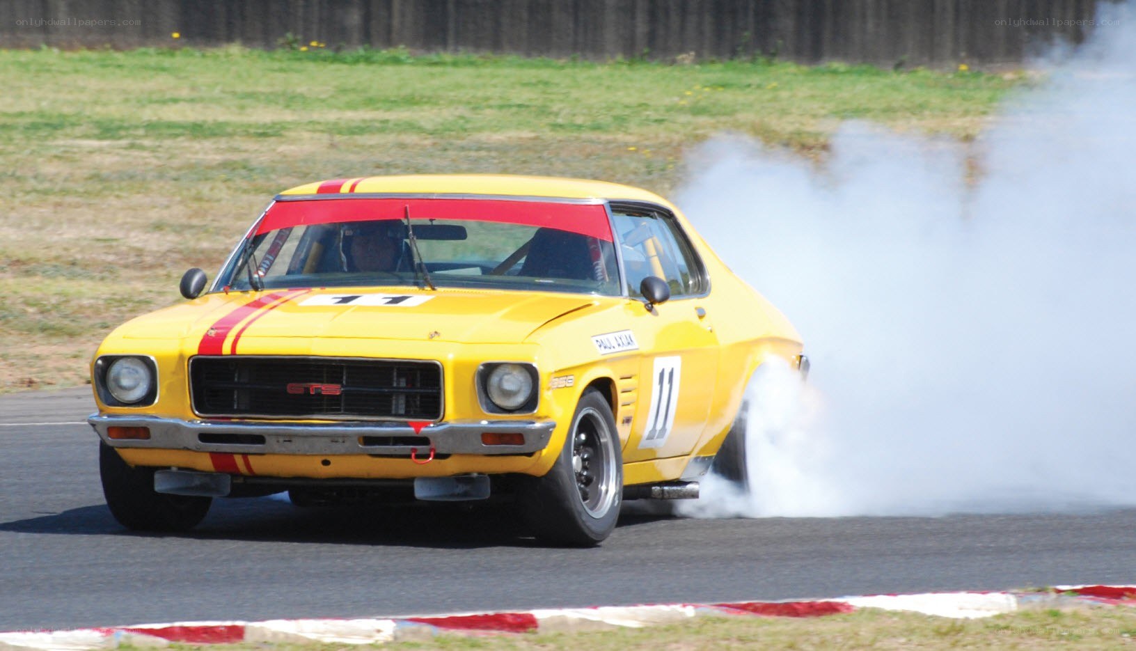 Yellow race car drifting
