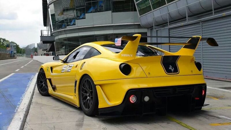 Yellow Race Car — Dynamic, Afternoon, Photograph, Race Track, Building