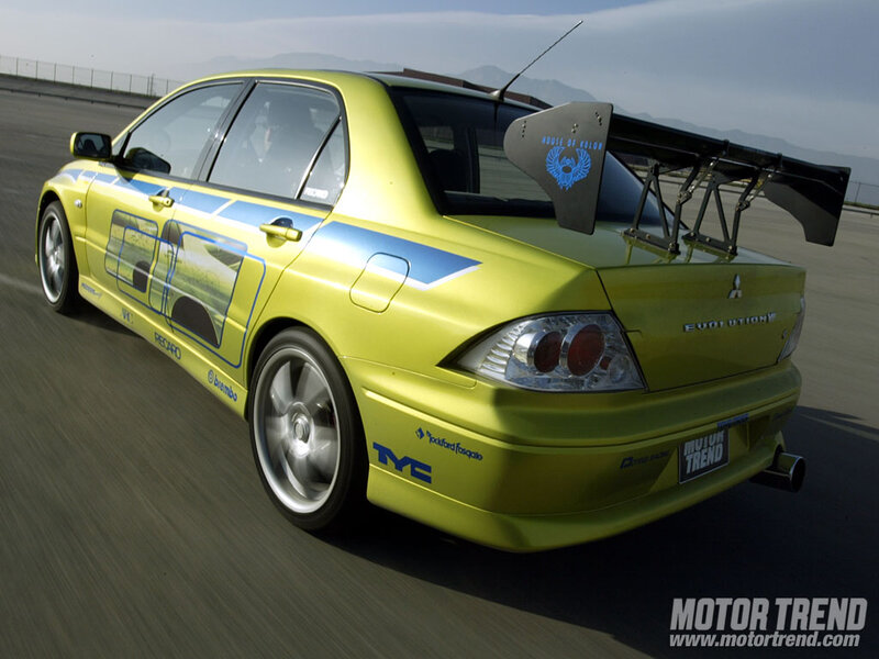 Yellow Race Car — Dynamic, Afternoon, Photograph, Race Track, Mountains