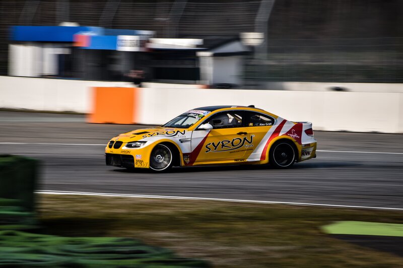 Yellow Race Car — Dynamic, Afternoon, Photograph, Racetrack