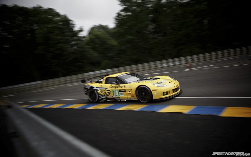 Yellow Race Car — Dynamic, Photograph, Race Track, Trees