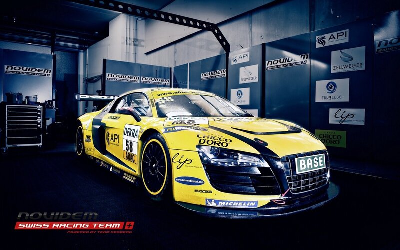 yellow race car in garage
