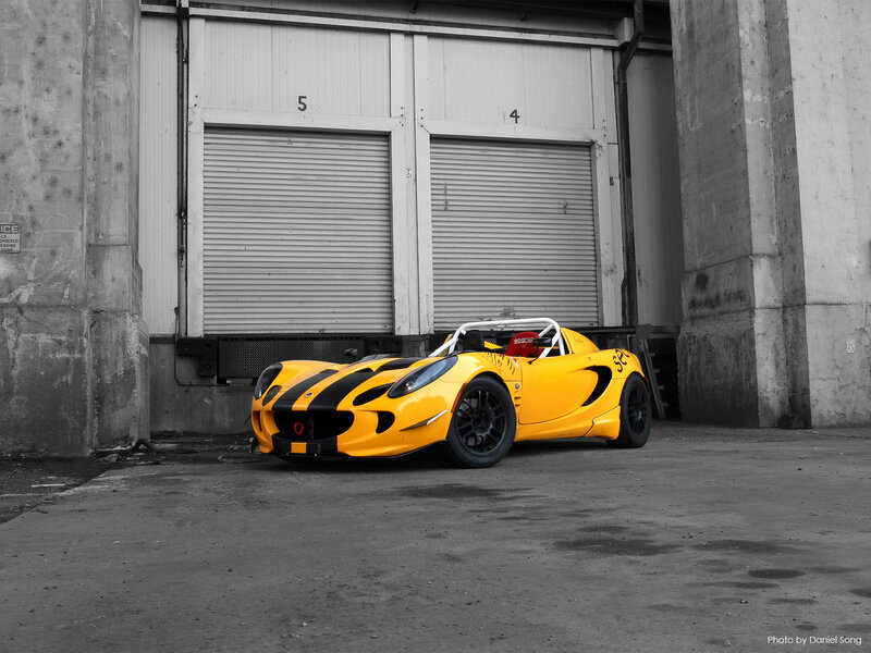 Yellow race car in garage