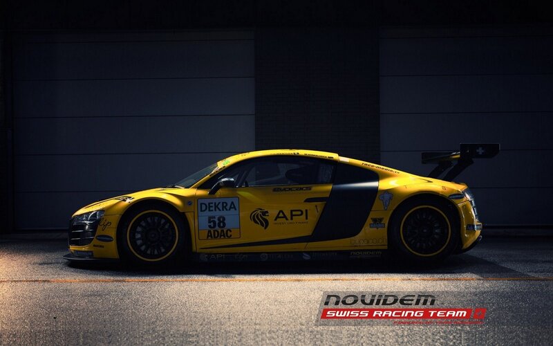 yellow race car in garage