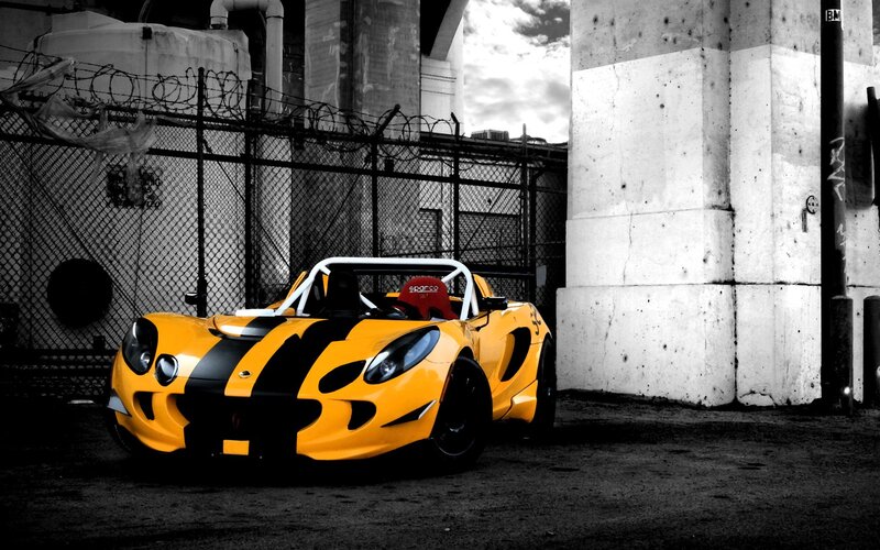 Yellow race car in industrial setting