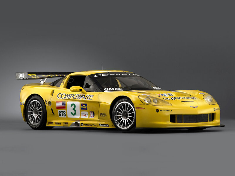 Yellow Race Car — Neutral, Photograph, Race Car, Sponsor Logos