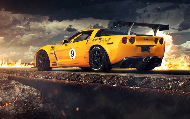 Yellow race car on fiery track