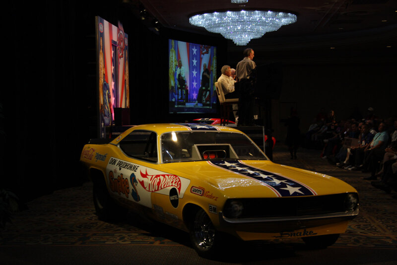 Yellow Race Car on Stage