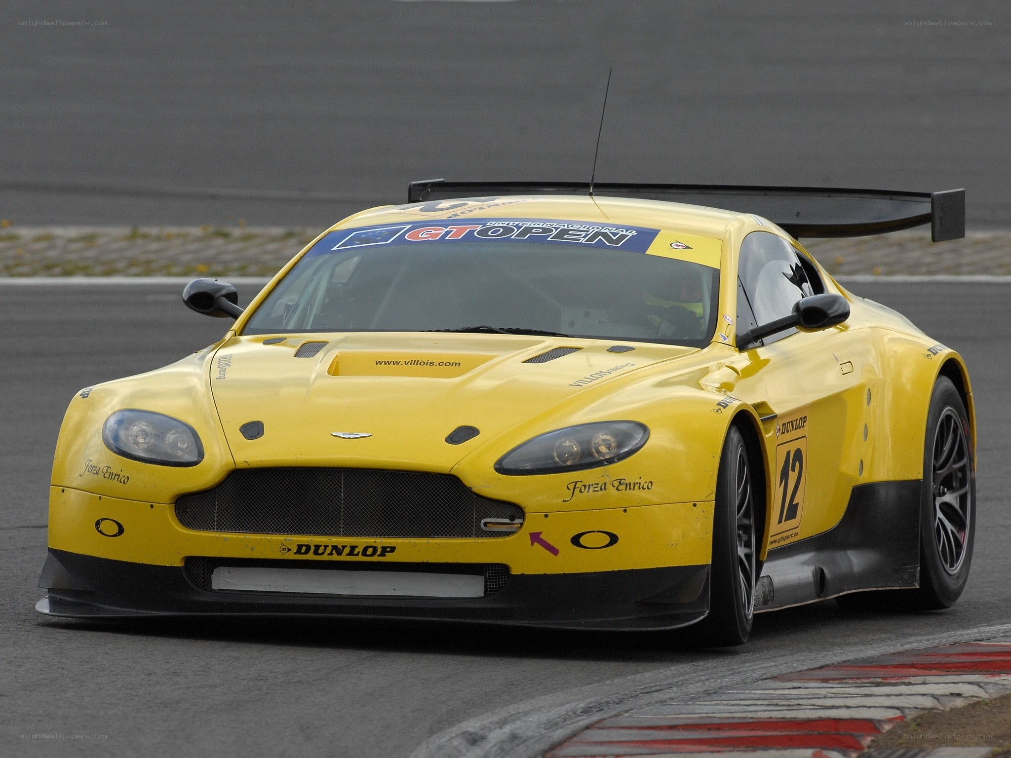 yellow race car on track