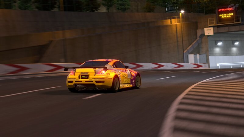 yellow race car on track