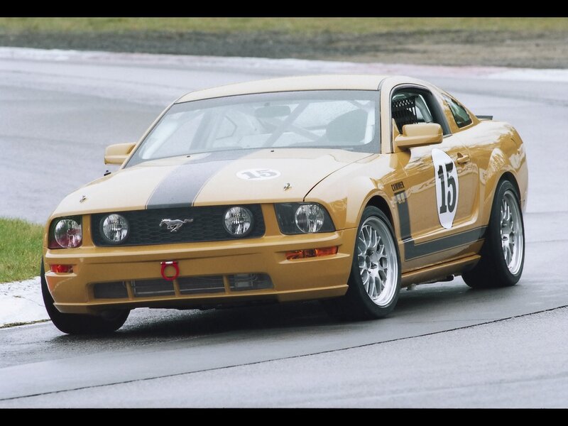yellow race car on track