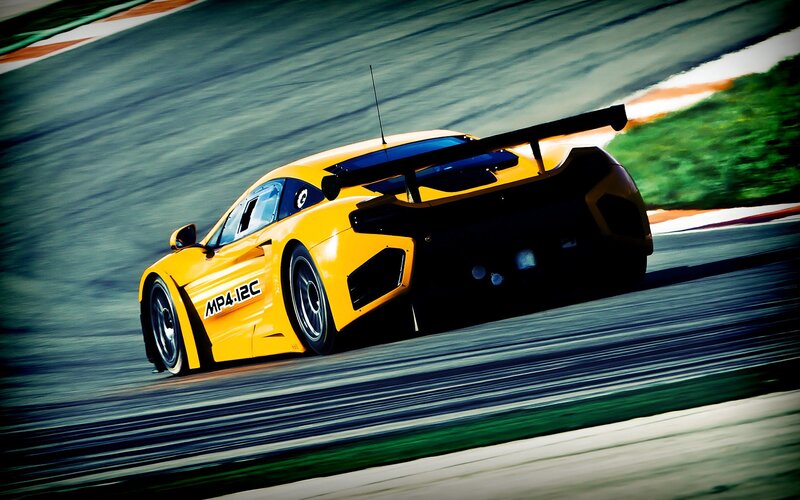 Yellow race car on track