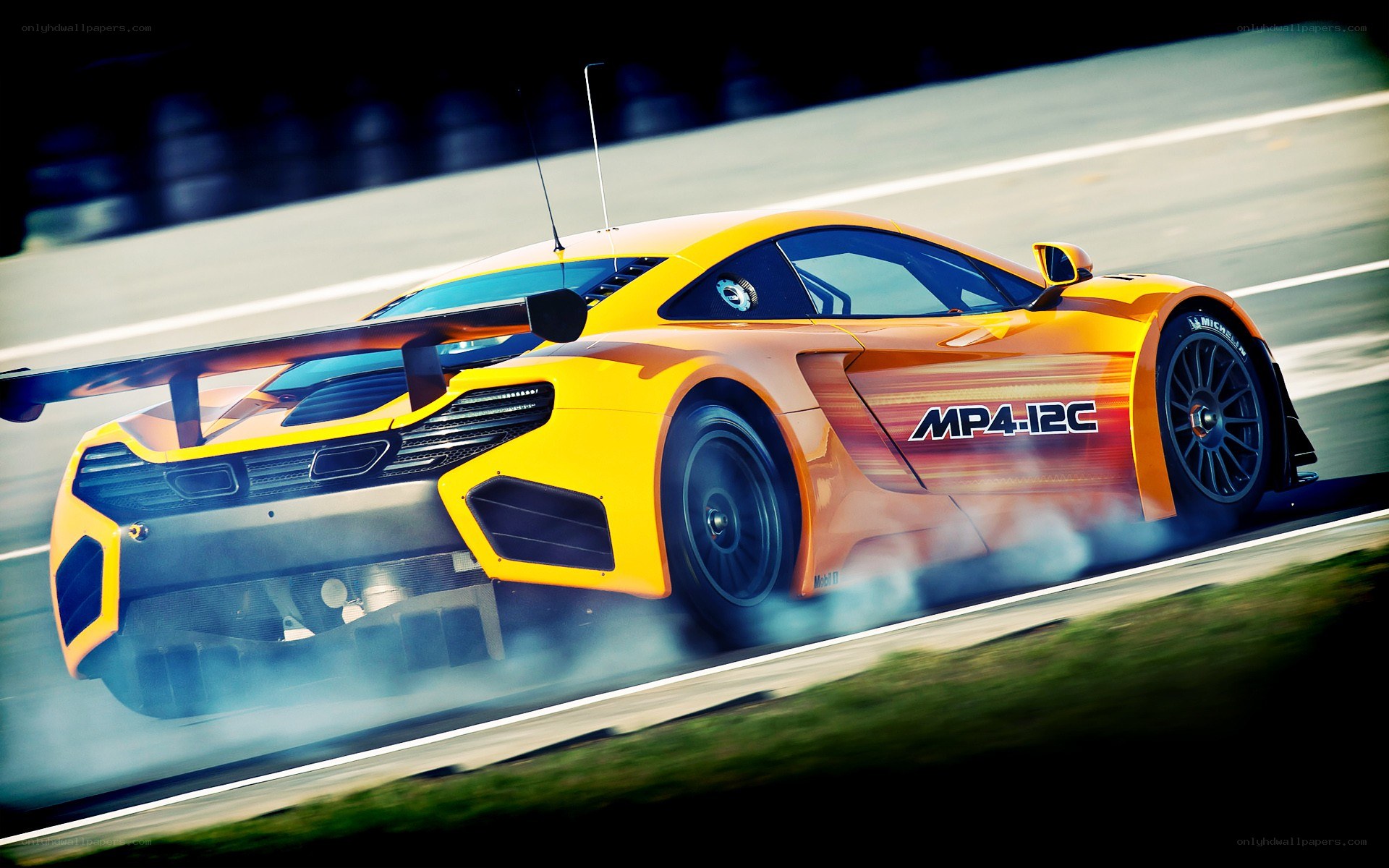 Yellow race car on track