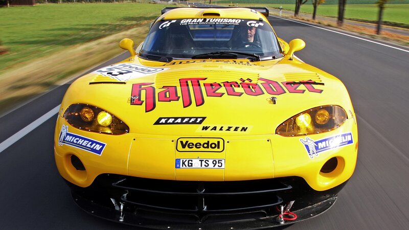 yellow race car on track
