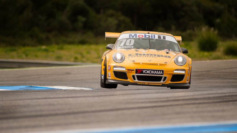 Yellow race car on track