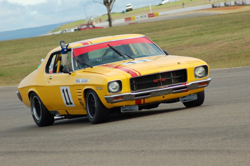 Yellow race car on track