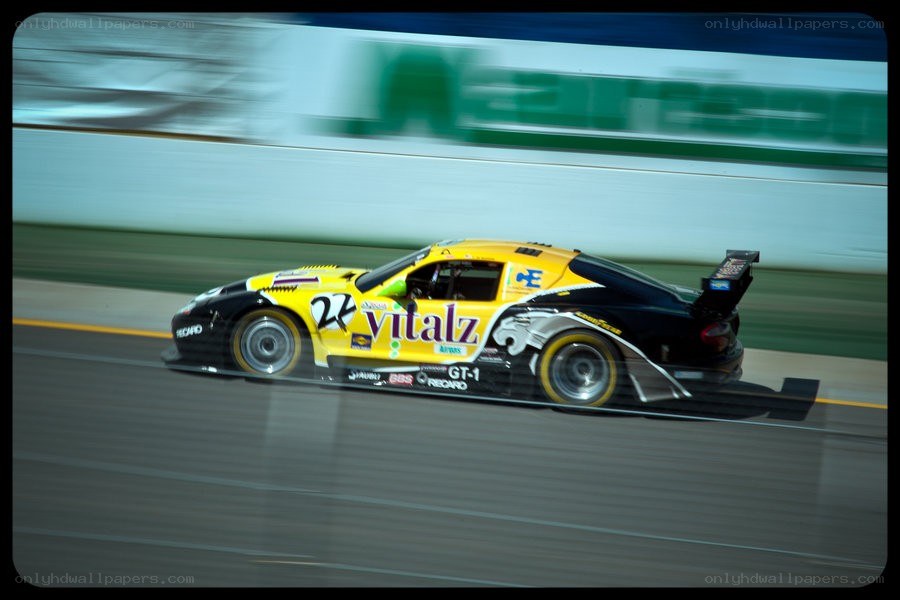 Yellow race car on track