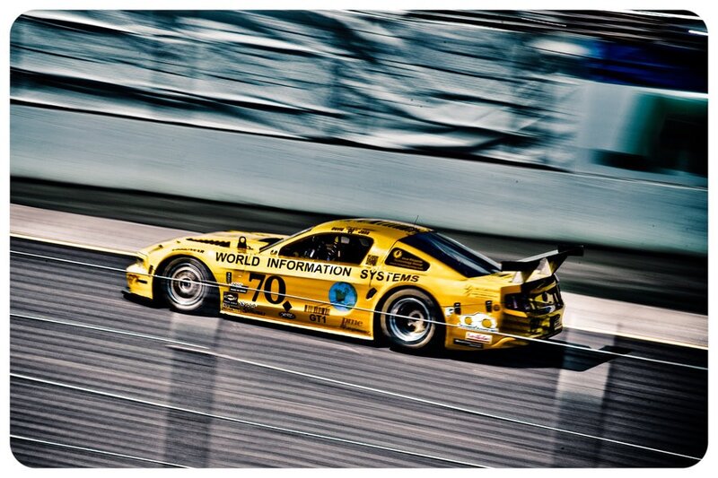 Yellow race car on track
