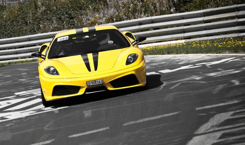 Yellow race car on track