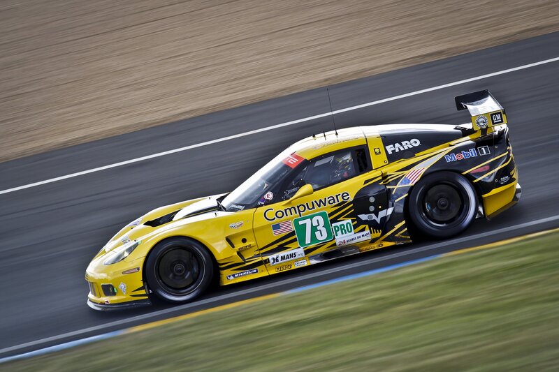 yellow race car on track