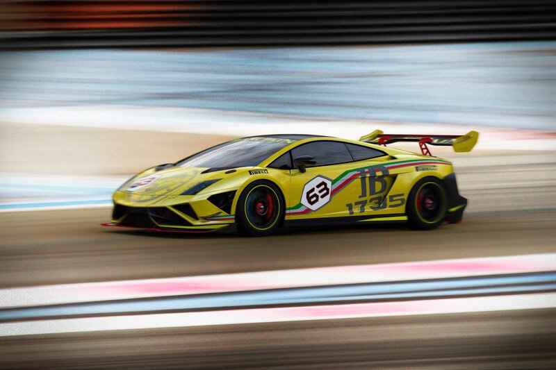 yellow race car on track