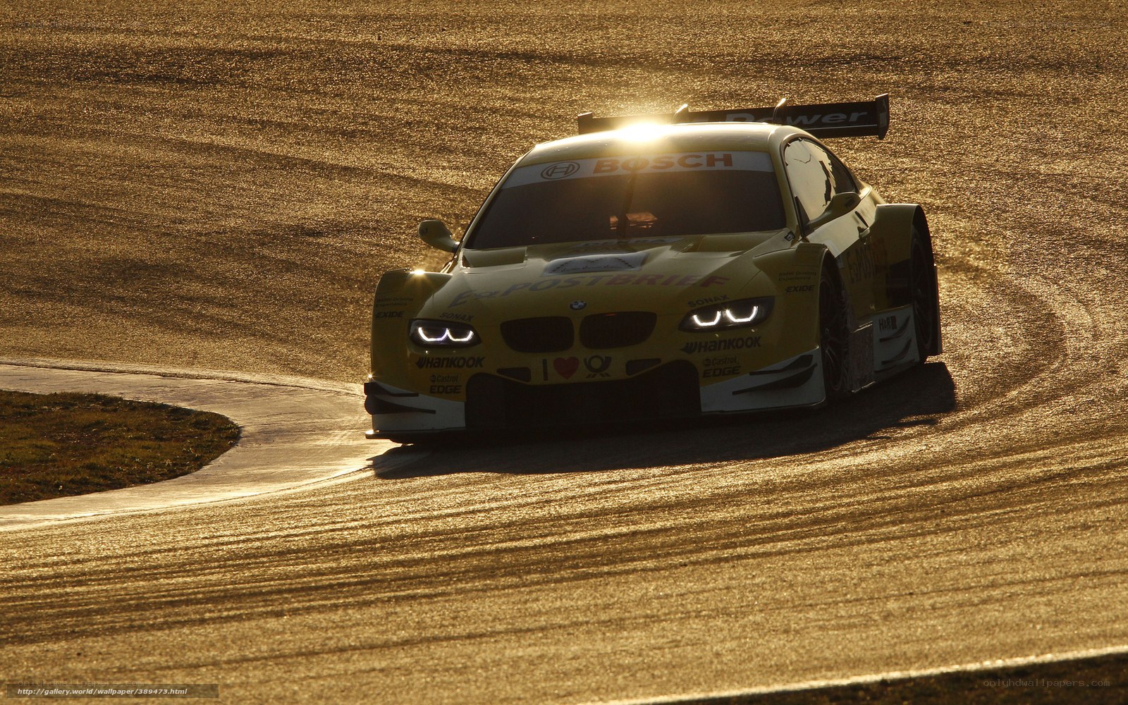 yellow race car on track