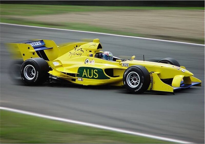 Yellow race car on track