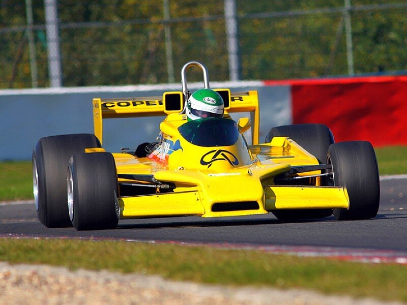 Yellow race car on track