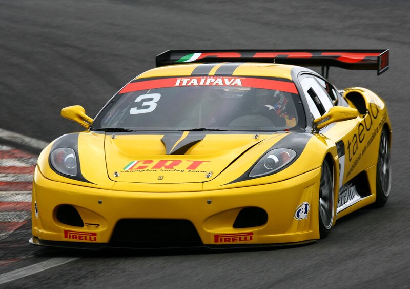 yellow race car on track