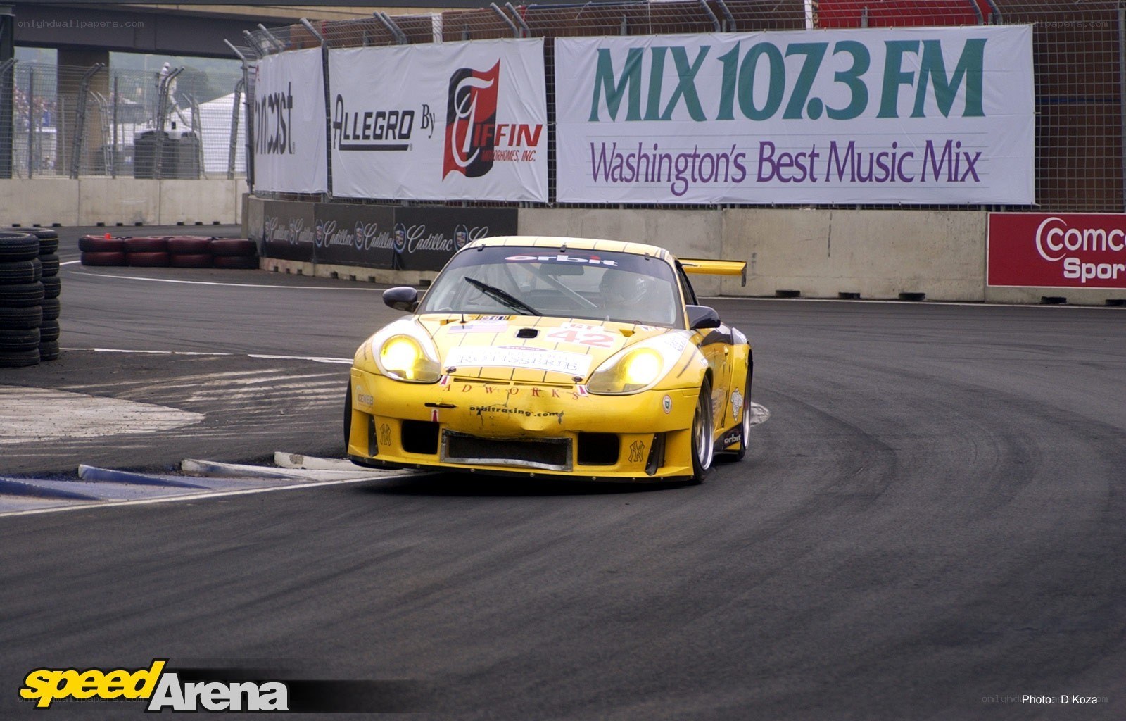 yellow race car on track