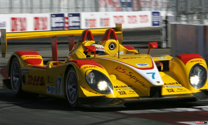 yellow race car on track
