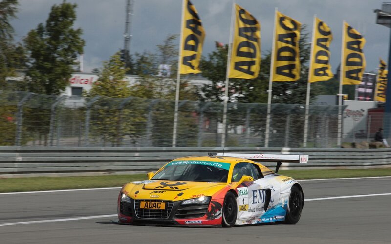 Yellow race car on track