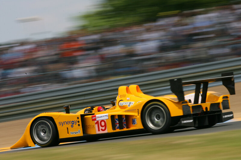 Yellow race car on track