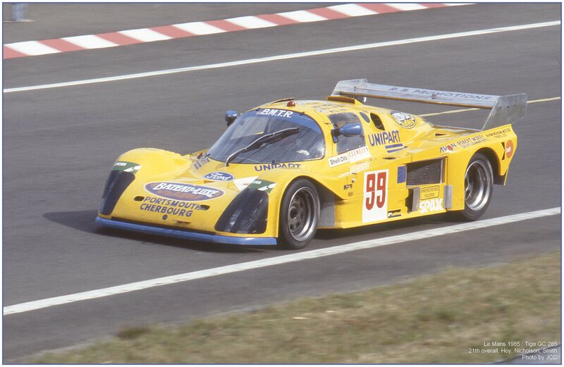 Yellow race car on track