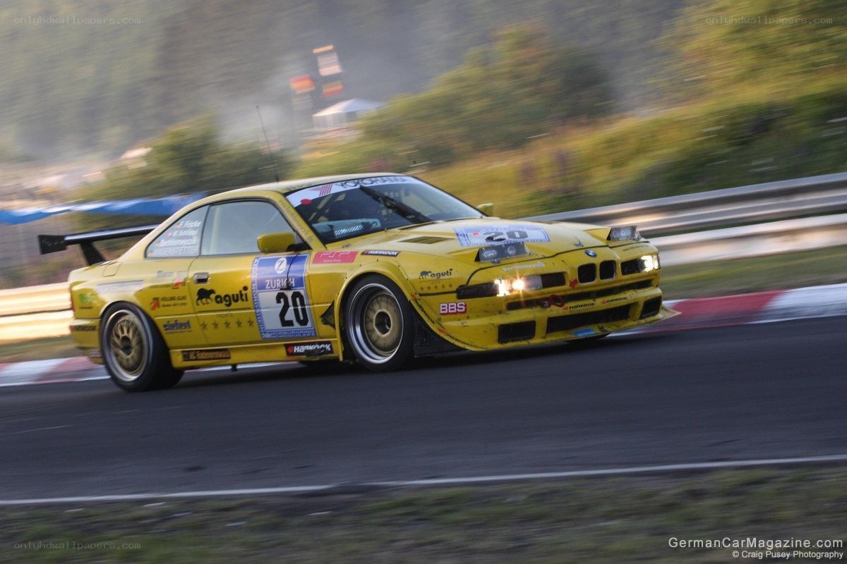 yellow race car on track