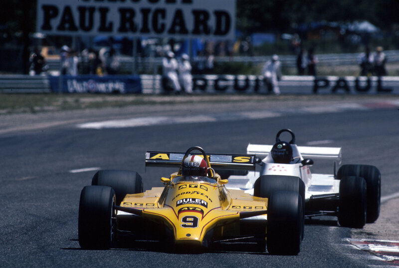 Yellow race car on track