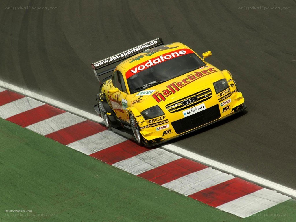 yellow race car on track