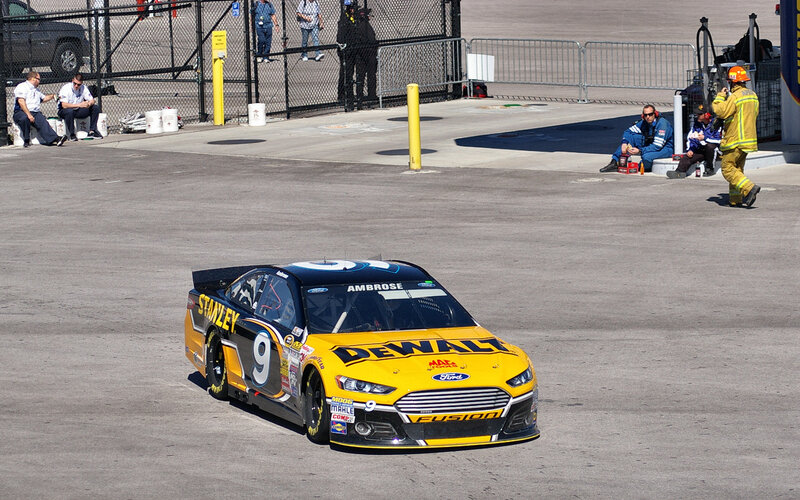 Yellow Race Car on Track — Active, Afternoon, Photograph