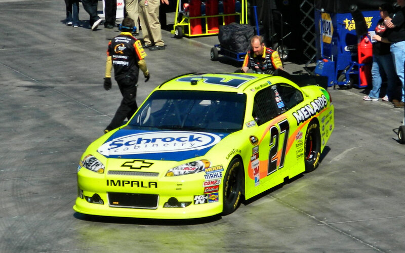 Yellow Race Car on Track — Active, Afternoon