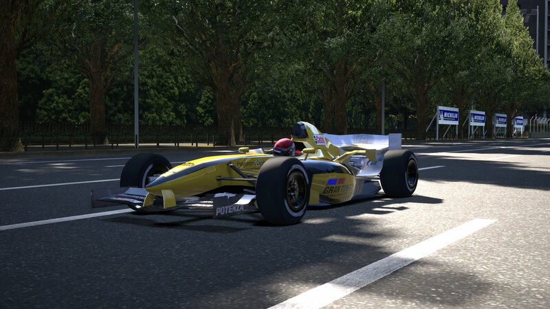 Yellow Race Car on Track — Calm, Afternoon