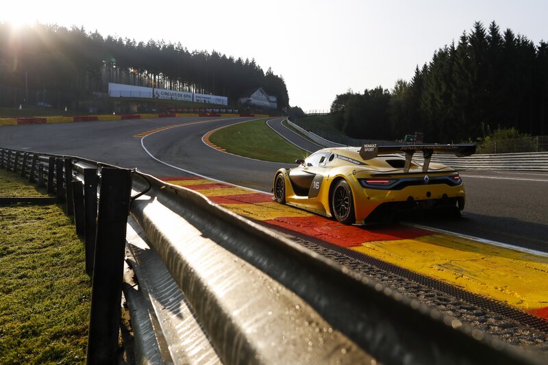 Yellow Race Car on Track — Dramatic, Sunset, Photograph