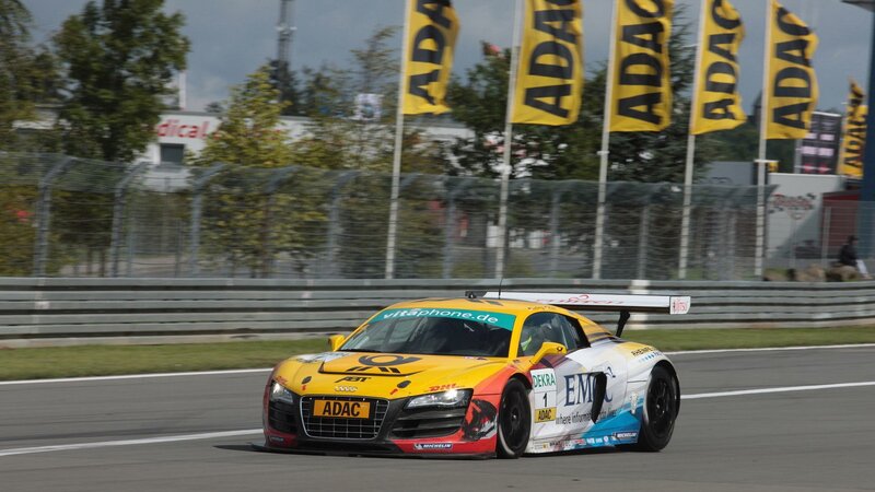 Yellow Race Car on Track — Dynamic, Afternoon, Photograph, Race Car, Flags