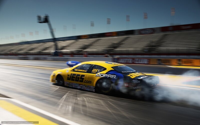 Yellow Race Car on Track — Dynamic, Afternoon, Photograph, Race Track