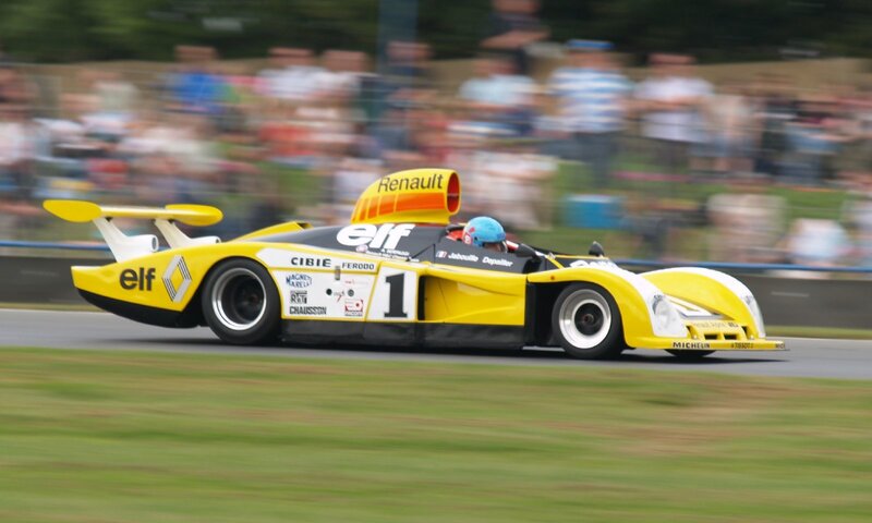 Yellow Race Car on Track — Dynamic, Afternoon, Photograph