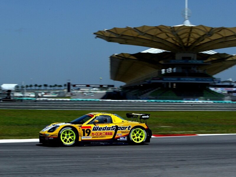 Yellow Race Car on Track — Dynamic, Afternoon