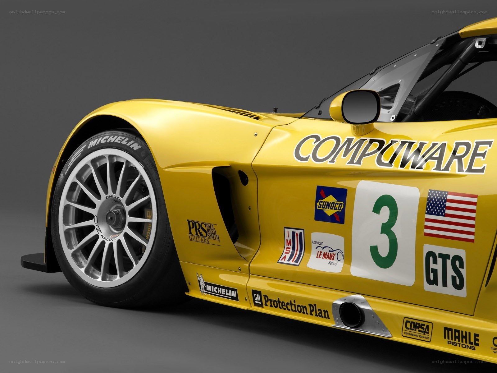 yellow race car side view