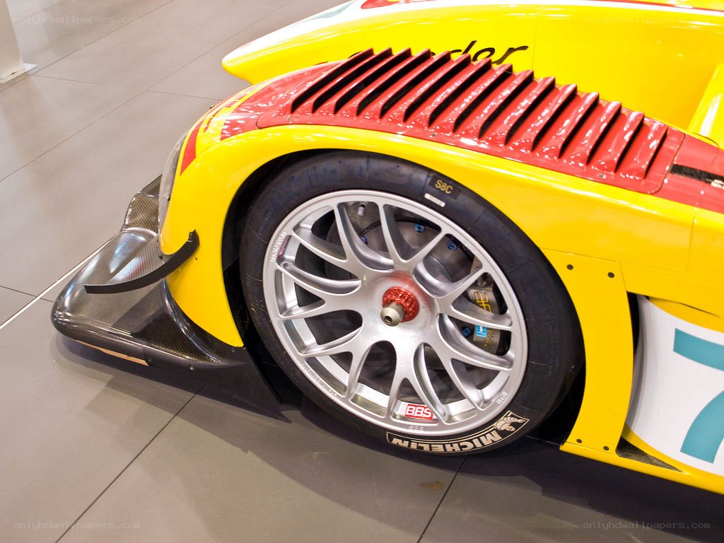 yellow race car wheel