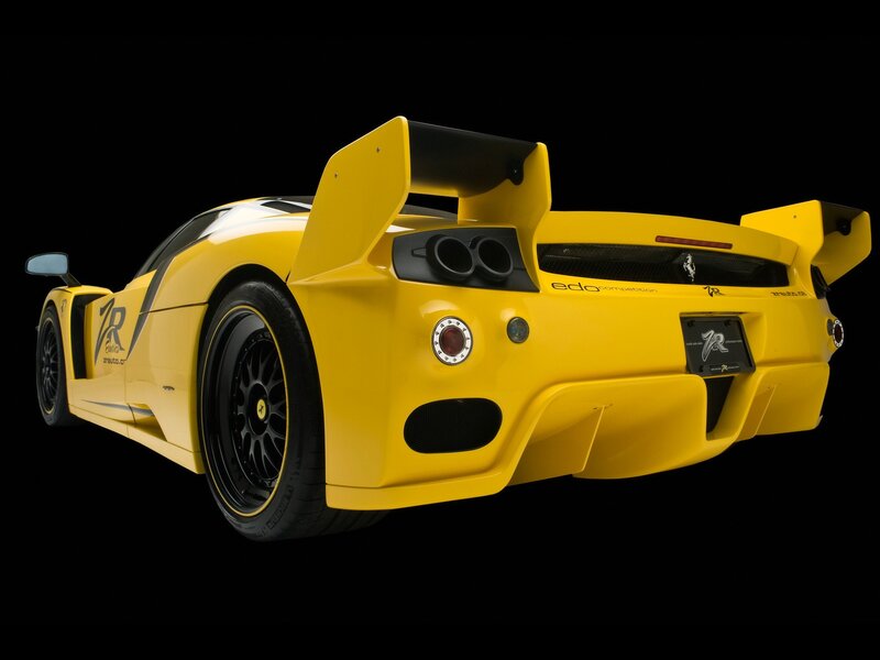 Yellow race car with large rear wing